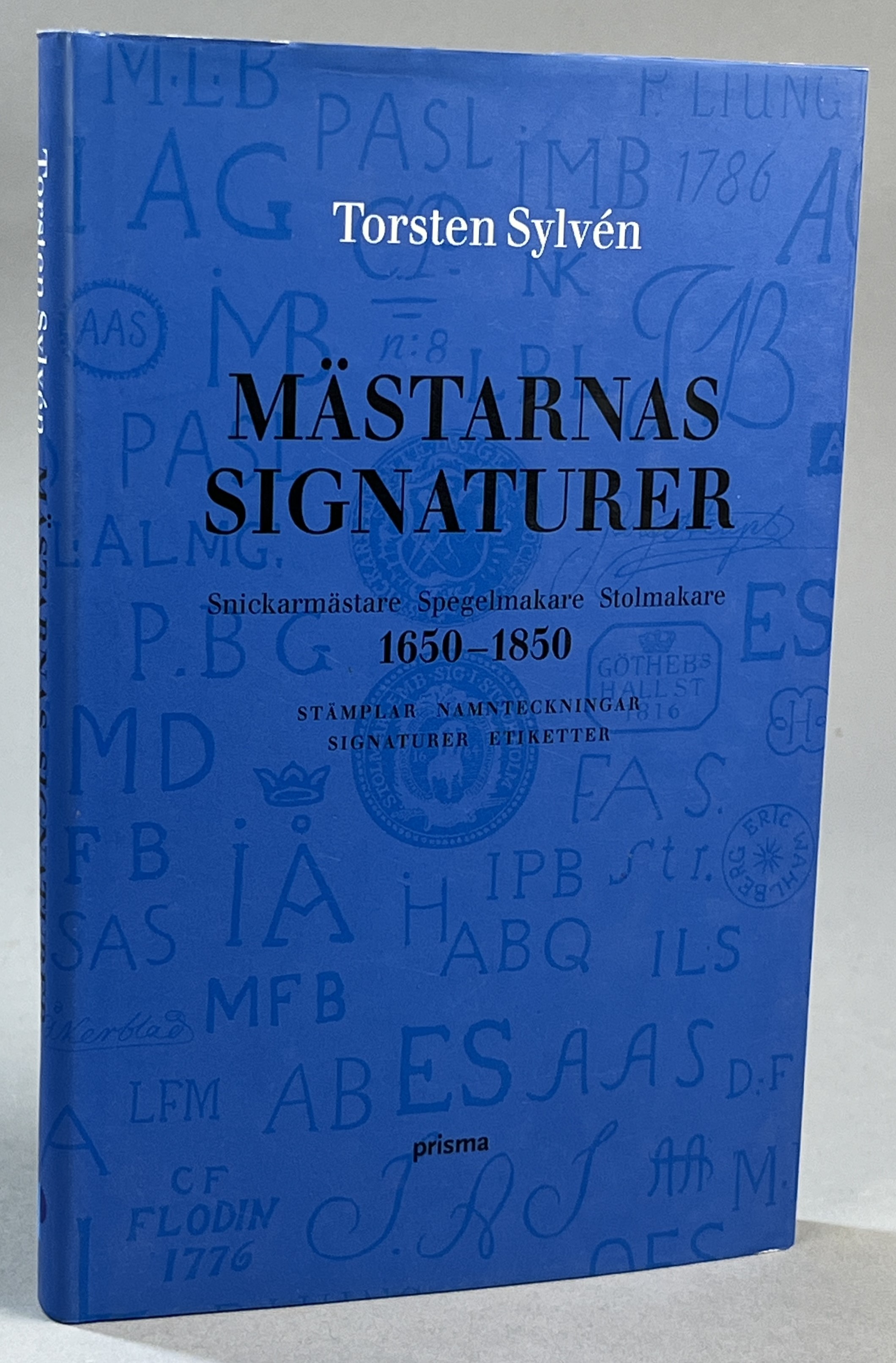 Mästarnas signaturer. Snickarmästare, spegelmakare, stolmakare 1650-1850. Stämplar, namnteckningar, signaturer, etiketter. [Utg. av] Prisma.
