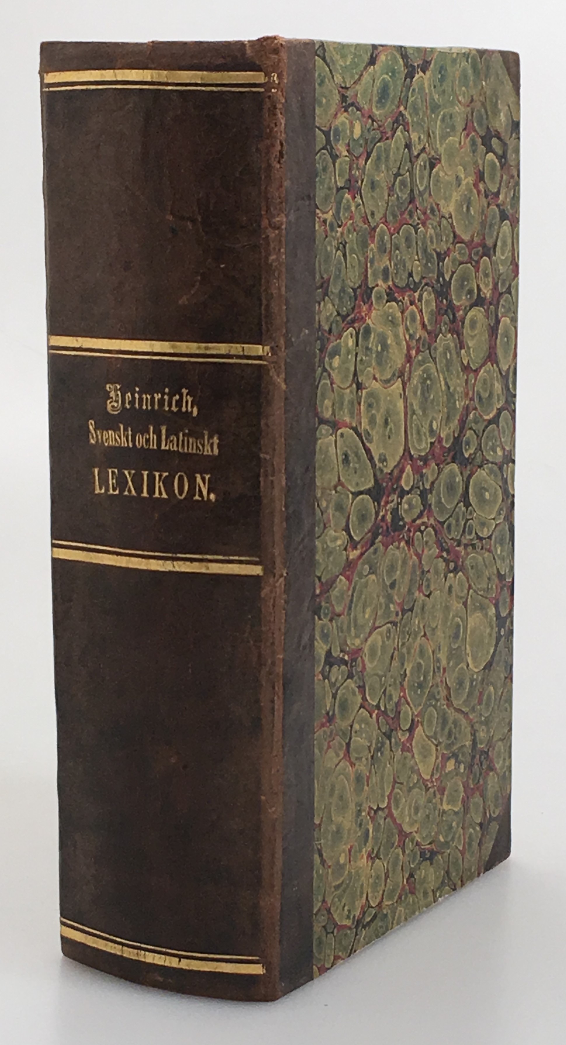 Svenskt och latinskt hand-lexikon, af Carl Heinrich.