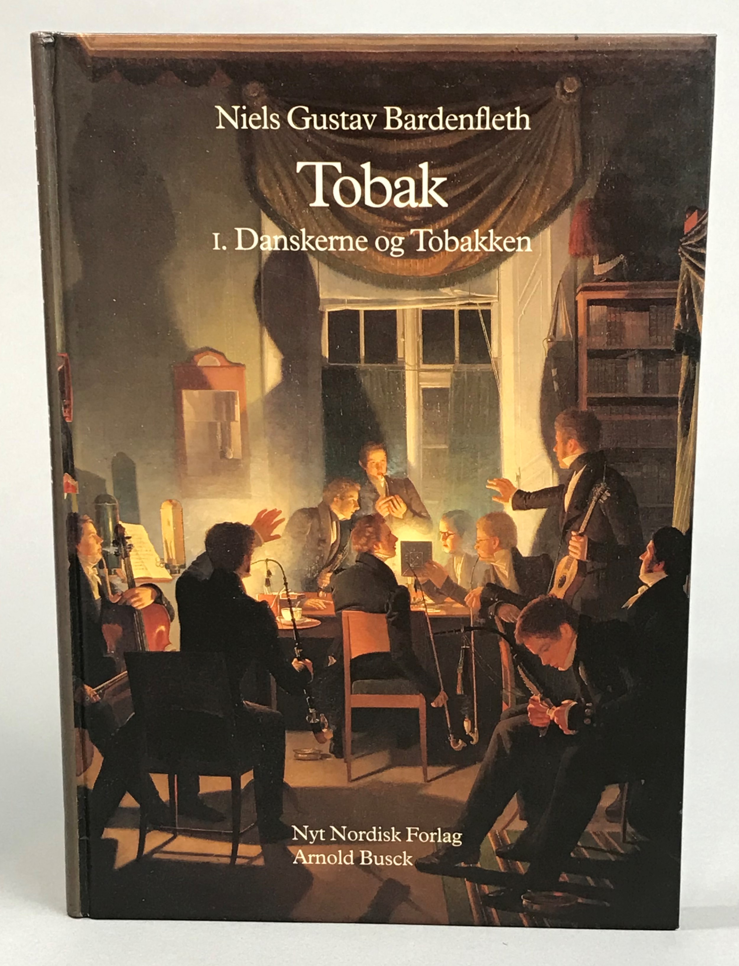 Tobak. Tilbedt og tugtet i 500 år. I. Danskerne og tobakken. [Utg. av] Nyt Nordisk Forlag.