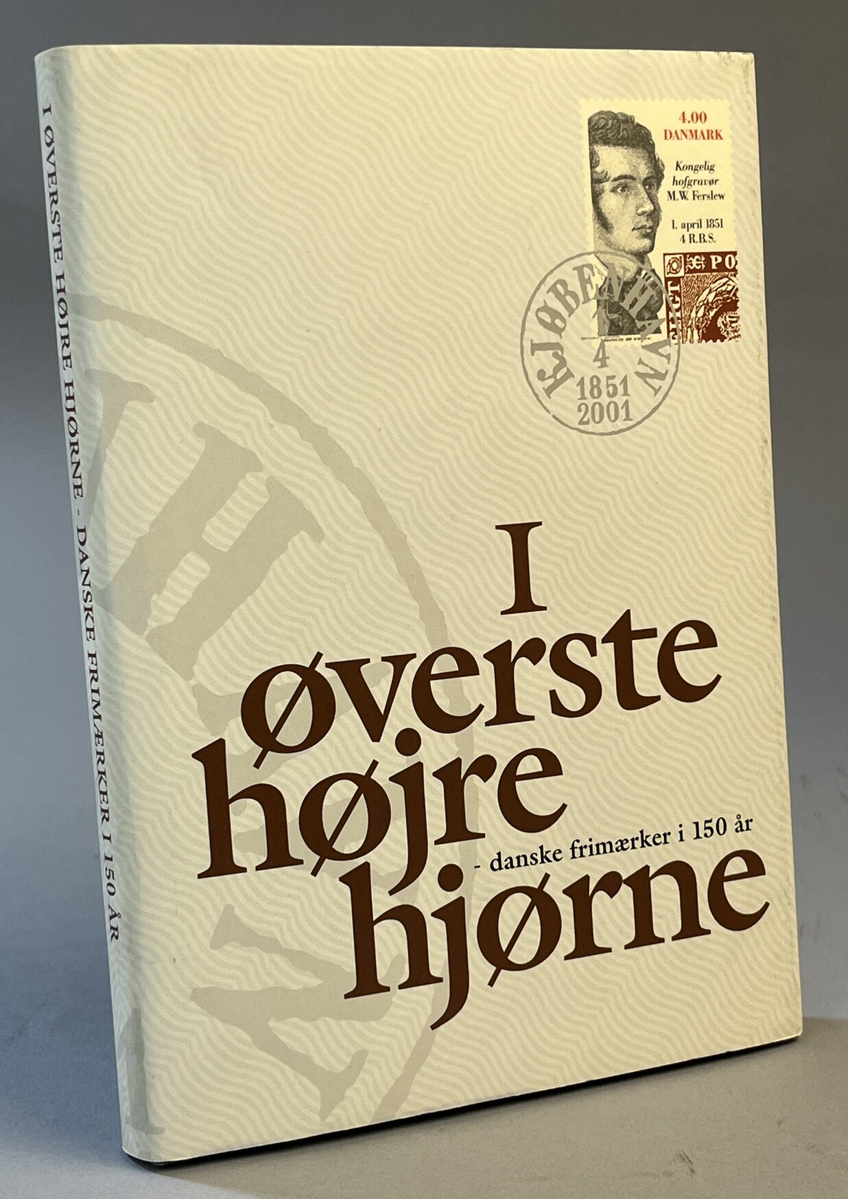 I øverste højre hjørne - danske frimærker i 150 år. [Utg. av] Post Danmark.