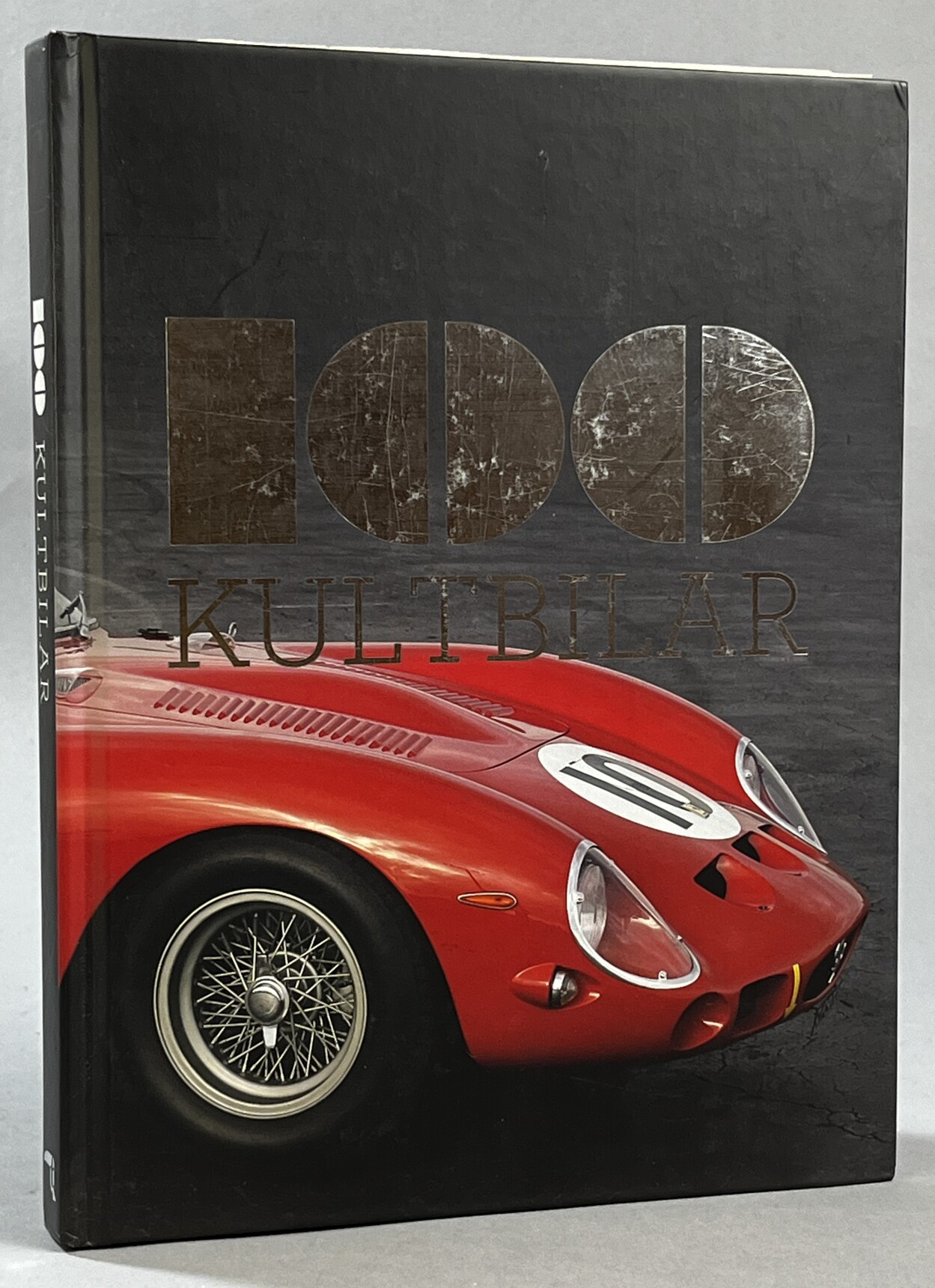 100 kultbilar. [Utg. av] Tukan förlag.
